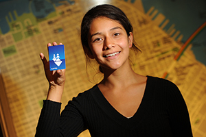 girl holding clipper card